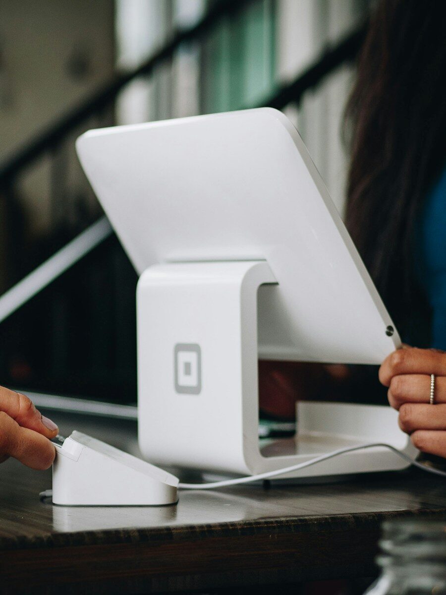 white monitor on desk